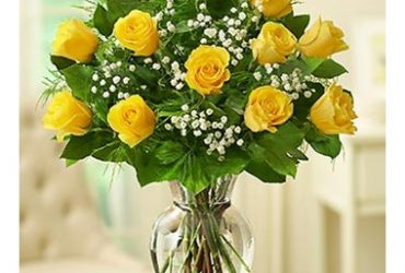 Yellow roses in vase as gift